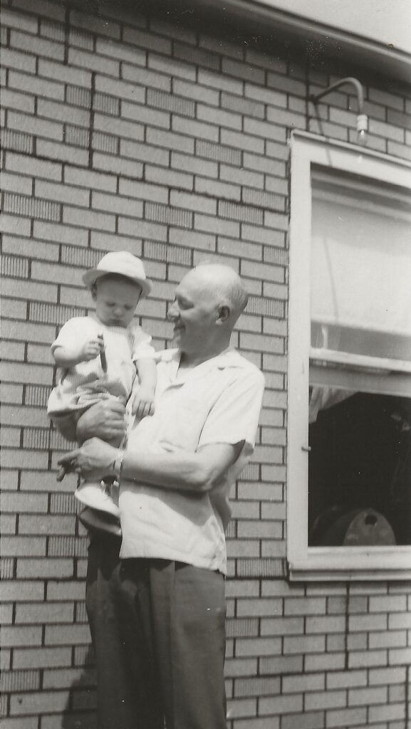 Oscar Johanson holding his grandson, Jeffrey Ring.