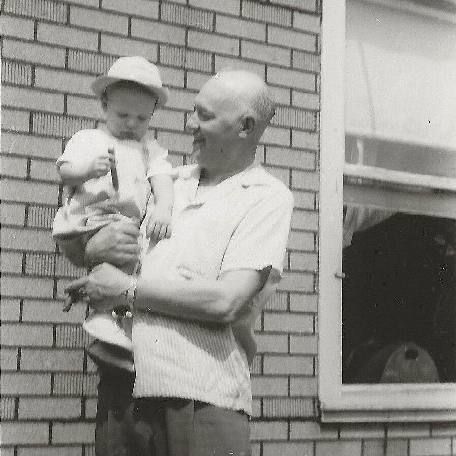 Oscar Johanson holding his grandson, Jeffrey Ring.