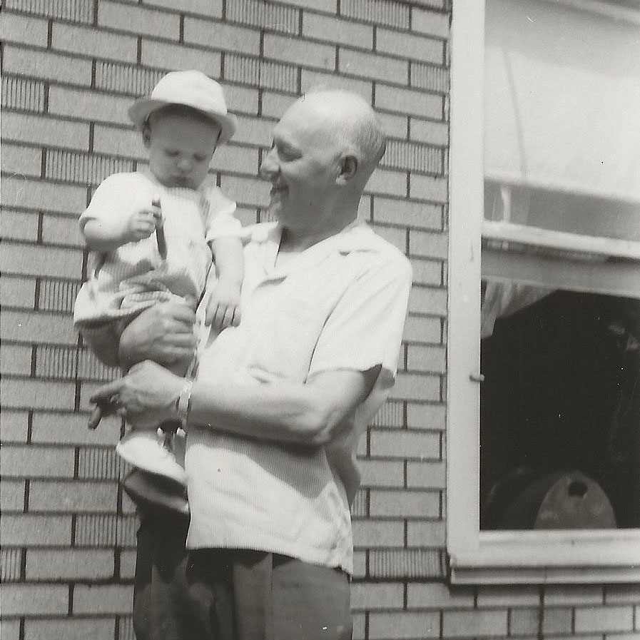 Oscar Johanson holding his grandson, Jeffrey Ring.